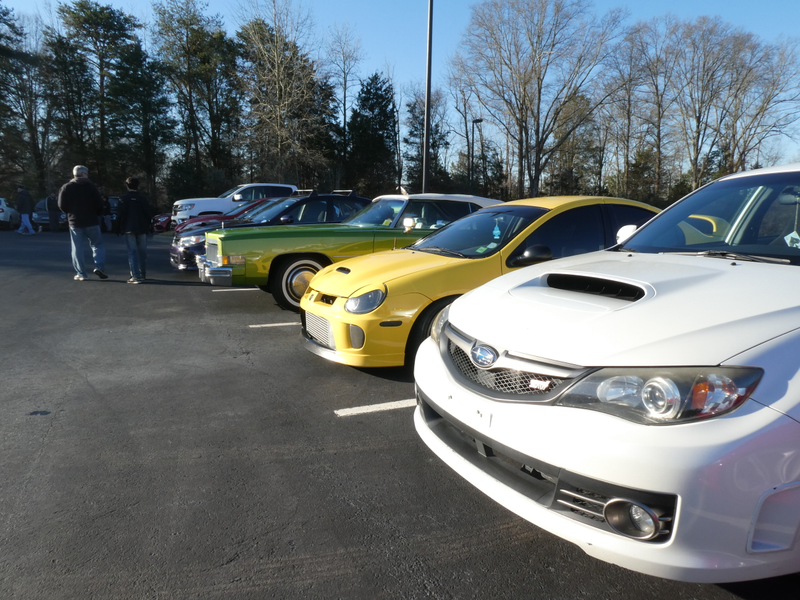 The green Cadillac was in beautiful shape, funny next to the Neon and the Sti